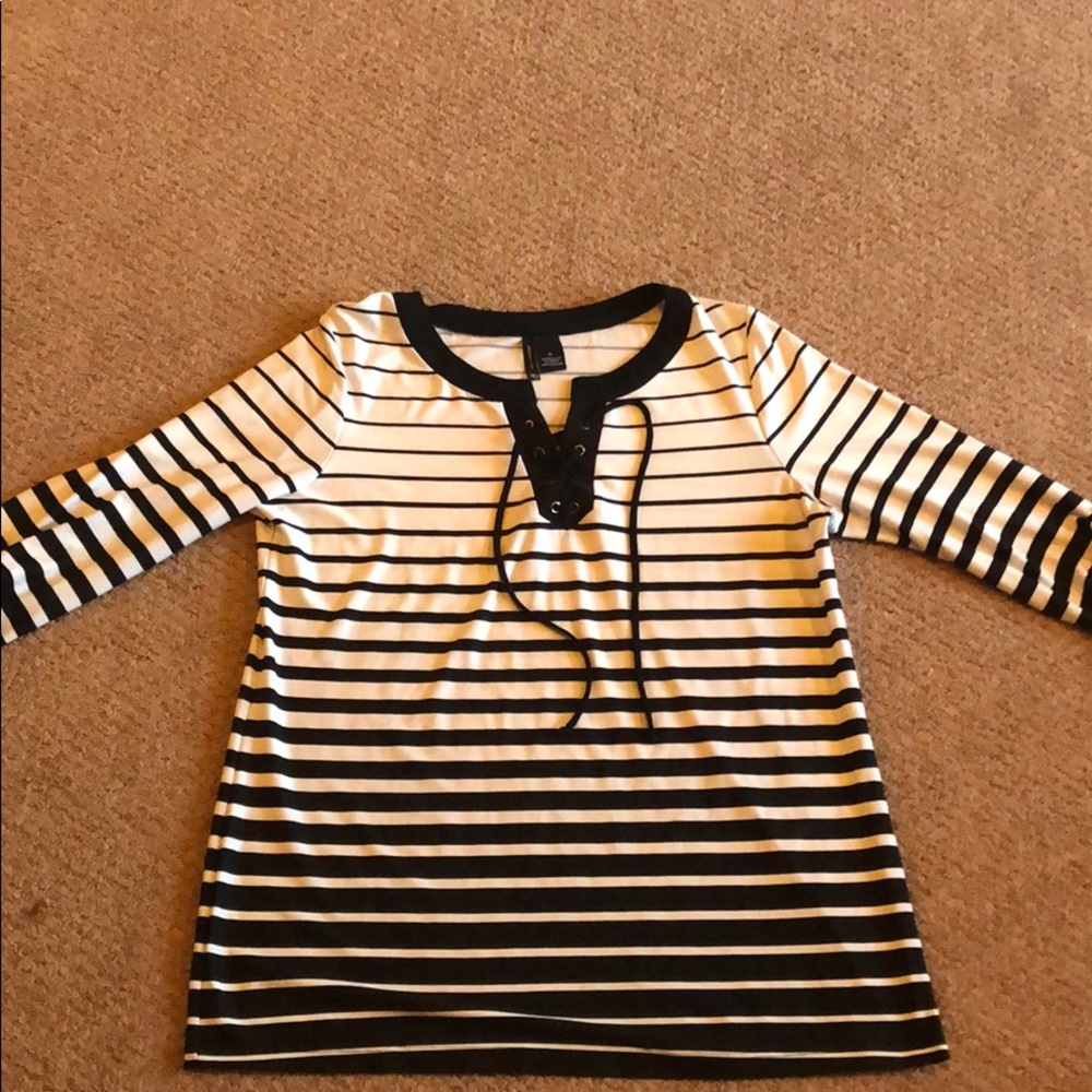 Women’s black and white top.